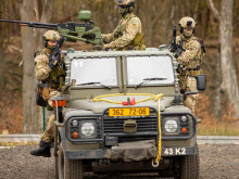 Which equipment for the Airborne Regiment - Light Armored Vehicles or Light Strike Vehicles?